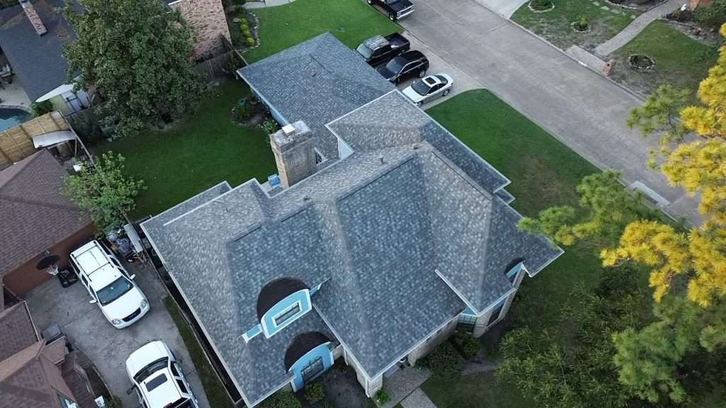 Executive Roofing team repairing a residential roof in Spring, TX